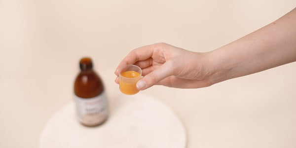 Eisensaft in Messbecher