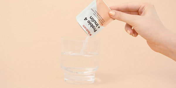 Redcare Probio 4 + in ein Glas Wasser geben