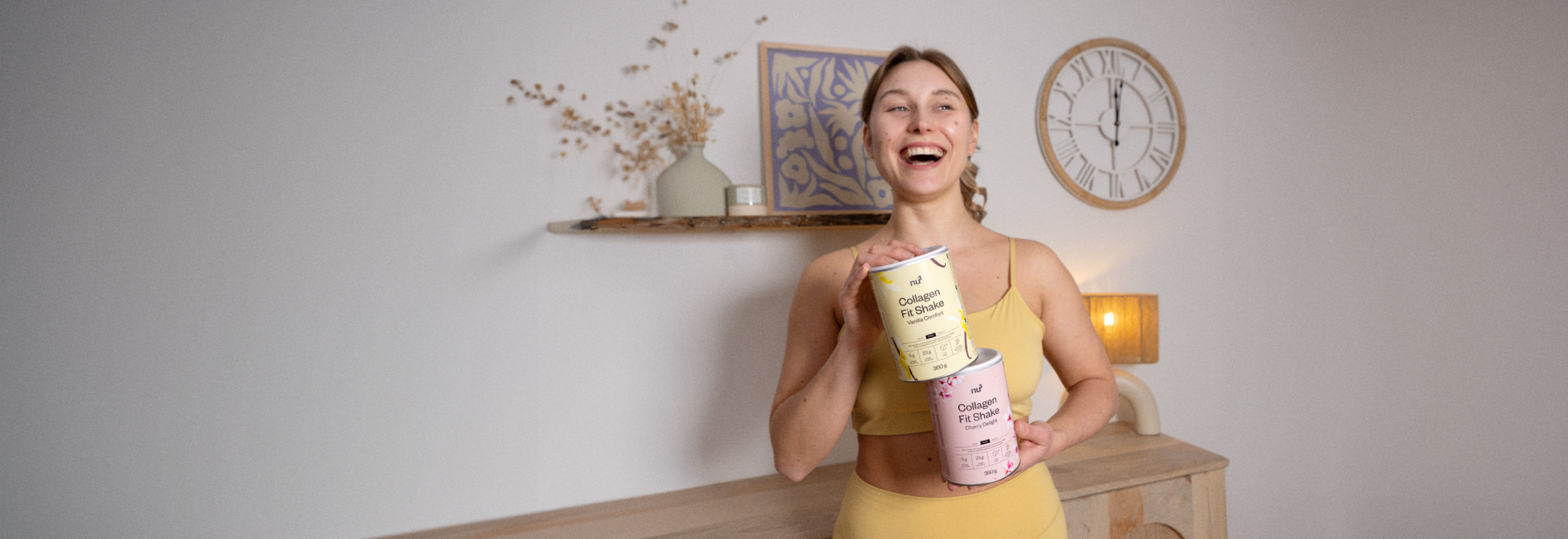 Glückliche Frau mit nu3 Collagen Fit Shake