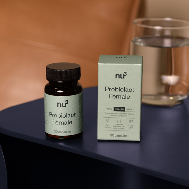 Probiolact Female Kapseln auf einem Stein